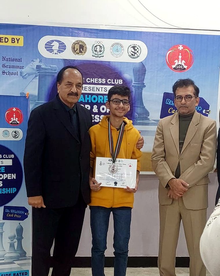 Ayan Ahsan with his medal and certificate at the Lahore junior and open championship