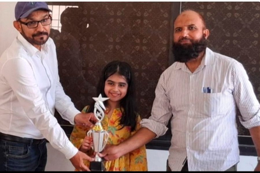 Rumaisa Afif holding her trophy after the Hyderabad qualifier